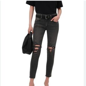 MOUSSY distressed black denim with holes.